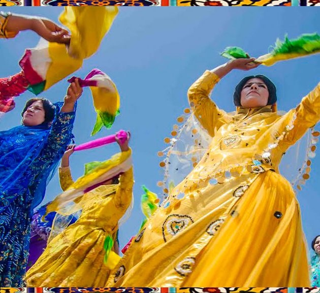 In a traditional wedding, Women are dancing with their colorful dress